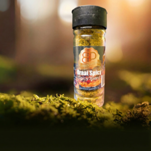 Booysen's Peppers Braai Spicy Blend seasoning bottle R55 outdoor nature background.